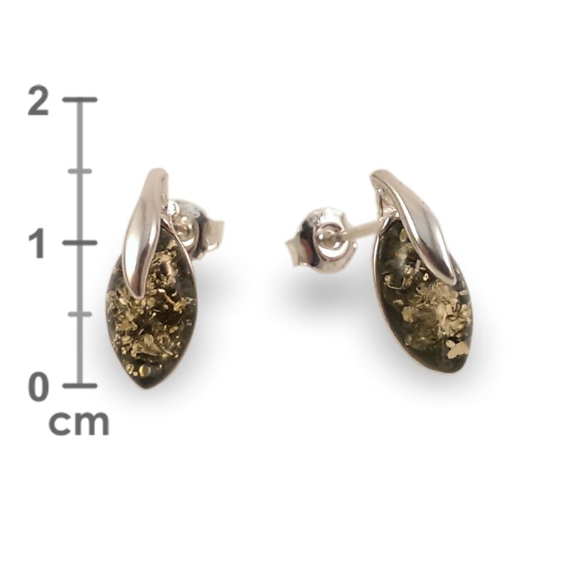 May include: A pair of silver earrings with green amber stones. The earrings are shaped like a leaf and are about 1 cm long.
