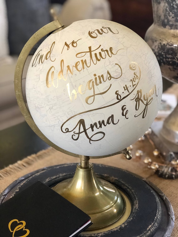 Wedding planning tips - guest book ideas - globe with couples wedding date - Wedding Soiree Blog by K’Mich, Philadelphia’s premier resource for wedding planning and inspiration - esty