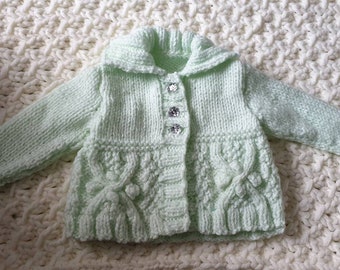 Pretty cabled baby cardigan