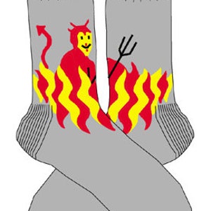 May include: A pair of gray socks with a red devil character in flames on one sock and a red and yellow flame design on the other sock.