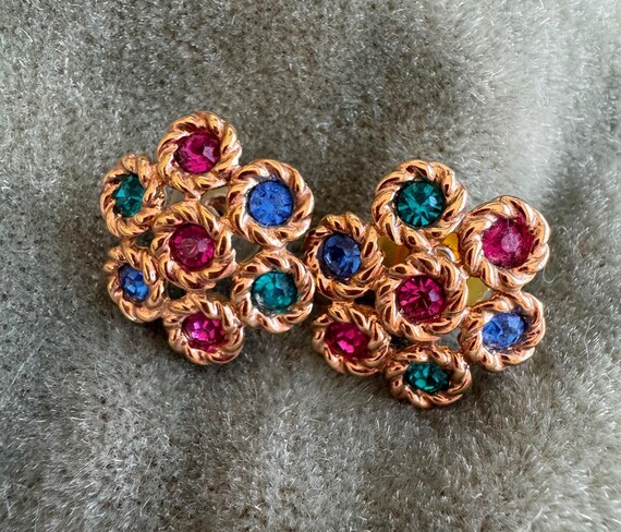 Vintage 1990s Swarovski colored crystal earrings, gold tone pierced swan signed