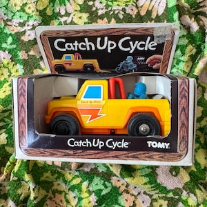 Vintage 80s Catch Up Cycle TOMY, tomy toys catch up cycle in original box 1982, vintage Tomy cars new old stock