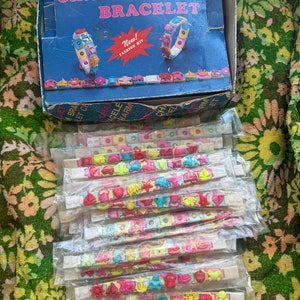 Vintage Plastic Charm Bracelets and original box 80s Snap Bell Charm Link Bracelet, Bell Charm plastic bracelet 1980s 33 bracelets included