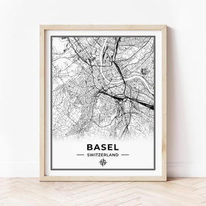 Peut inclure: Impression d'une carte de Bâle, en Suisse, en noir et blanc, avec le nom de la ville et le nom du pays imprimés sous la carte. Une rose des vents est imprimée sous le nom du pays.