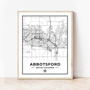 May include: Black and white map print of Abbotsford, British Columbia. The map shows the city's streets and landmarks. The city name and province are printed below the map.