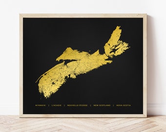 May include: A gold foil map of Nova Scotia on a black background. The map includes the names "Mi'kmaq", "L'Acadie", "Nouvelle-Écosse", "New Scotland", and "Nova Scotia".