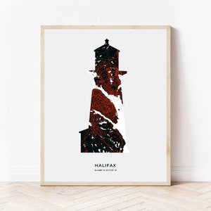 May include: A black and white lighthouse silhouette with red street map details. The lighthouse is superimposed over the city of Halifax, Nova Scotia, Canada. The text "HALIFAX" and the coordinates "44.6488° N, 63.5732° W" are printed below the lighthouse.