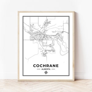 Puede incluir: Mapa de Cochrane, Alberta, en blanco y negro. El mapa muestra las calles, los ríos y otras características geográficas de la ciudad. El nombre de la ciudad y la provincia están impresos debajo del mapa.