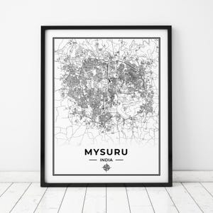 May include: Black and white city map print of Mysuru, India. The map is framed in a black frame and includes a compass icon.