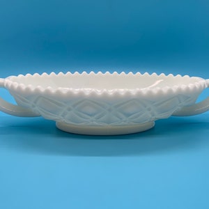 Milk Glass Oval Handled Dish with a quilted design