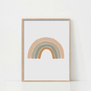 May include: A framed print of a rainbow with muted tones of peach, green, and brown. The rainbow is a simple, abstract design.