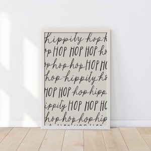 May include: A black and white printable wall art print with the words "hippily hoph", "op HOP HOP HOP ho", "op hop hop HOP HI", "hop hippily ho", "HOP HOP hop hipp", "ippily HOP HOP HC", "hop hop hop hip" repeated in a random pattern.