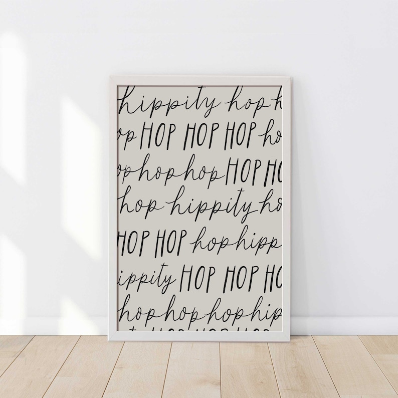 May include: A black and white printable wall art print with the words "hippily hoph", "op HOP HOP HOP ho", "op hop hop HOP HI", "hop hippily ho", "HOP HOP hop hipp", "ippily HOP HOP HC", "hop hop hop hip" repeated in a random pattern.