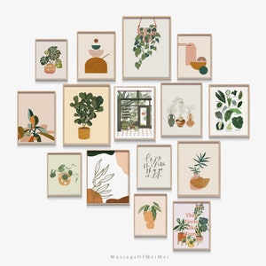 Puede incluir: Una pared de galer&iacute;a con 13 impresiones enmarcadas con un tema bot&aacute;nico. Las impresiones presentan varias plantas, incluyendo helechos, monstera y ficus lyrata. Algunas impresiones tienen texto, como "Las plantas hacen felices a las personas" y "Disfruta de las peque&ntilde;as cosas de la vida".