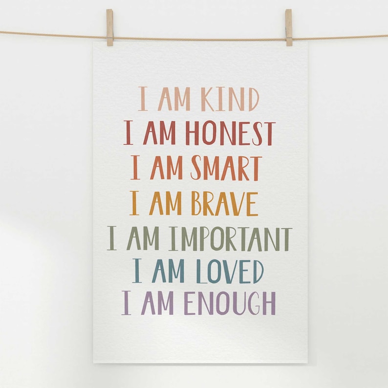 May include: A white poster with a rainbow-colored text design that reads "I am kind, I am honest, I am smart, I am brave, I am important, I am loved, I am enough".