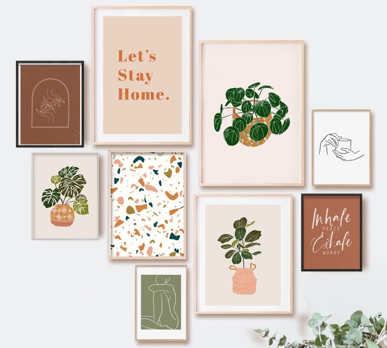 May include: A set of nine printable wall art prints featuring abstract line art, plants, and inspirational quotes. The prints are in a minimalist style with a neutral color palette of brown, green, and white.