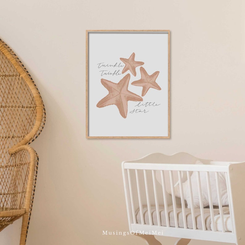 May include: A nursery print with three starfish in shades of brown and beige. The print features the text "Twinkle Twinkle Little Star" in a cursive font.