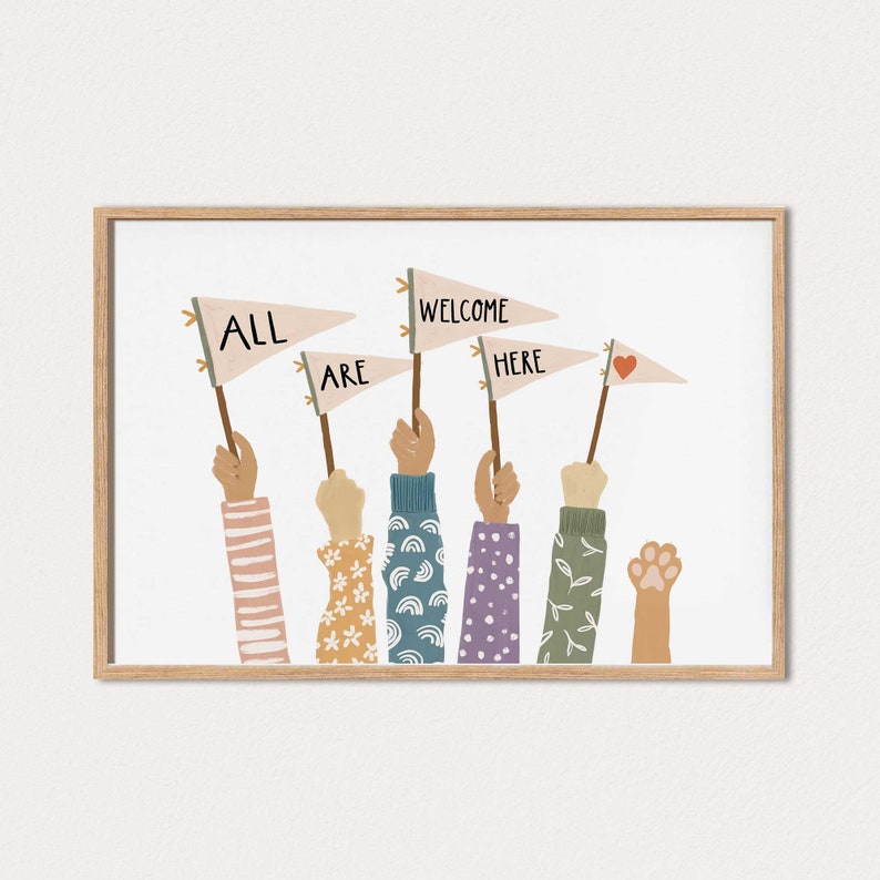 May include: A colorful illustration of six hands holding up flags with the words "ALL ARE WELCOME HERE" and a heart. The flags are on a white background and the hands are wearing different patterned sleeves.