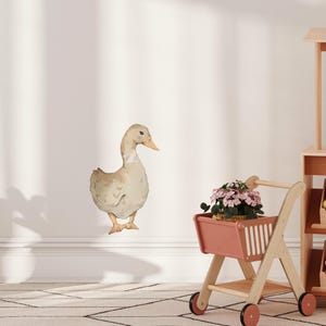 May include: A set of three ceramic nesting bowls in shades of blue, green, and white. The bowls feature a speckled glaze and a simple, modern design. The largest bowl is approximately 6 inches in diameter.