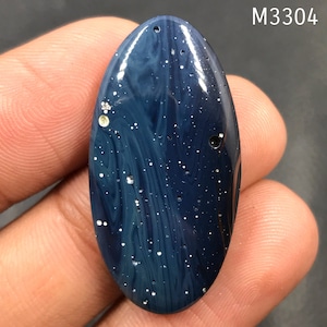 Leland Blue Cabochon...Oval Cabochon...34x18x5 mm...28 Cts...A#M3304