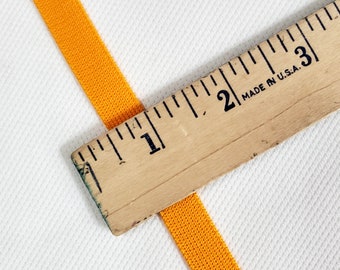Trim lt light gold   1/2 inch, 3/8 inch, 1 inch  wide cheer leader  cheerleader athletic uniform  team price per yard