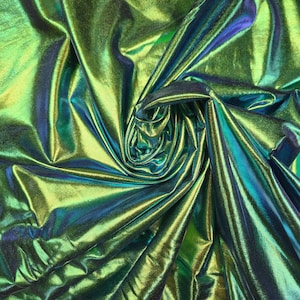 Fabric polyester 95 spandex 5 percent  tones of  green purple blue iridescent  foil printed  on black 2 way stretch 56&quot; wide priced  1/2 yd