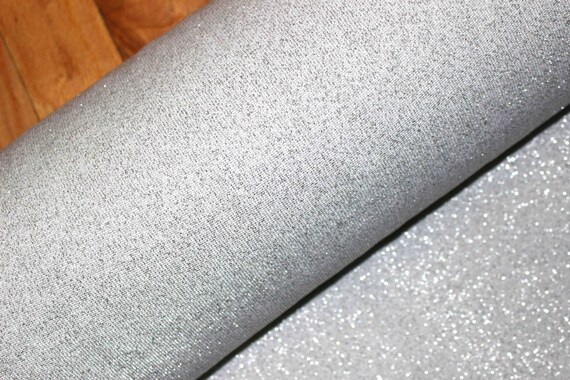 Stretch  rib trim knit cheerleader Athletic rib tubular fabric 44 inch total  width  silver metalic priced per inch