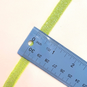 Trim  1/2  inch wide sparkle neon green  cheer leader athletic uniform  school pom pom  team price per yard