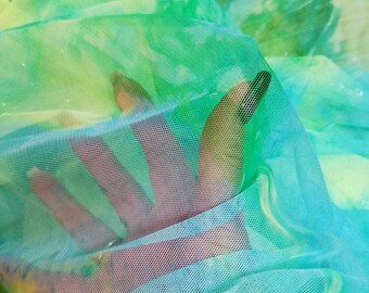 Fabric mesh neon green light medium blue  silver glitter shimmer   100 percent polyester mesh  56 inches wide sold by the  yard