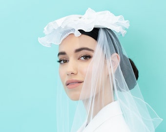 Tide - pleated Chiffon waves on a straw base with veil - White