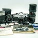 Famous CANON AE-1 Film SLR Camera with Huge Bundle. Full Set comes from the original owner, Mint Condition!