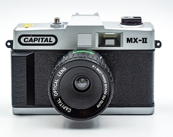 Capital MX-II 35mm camera. With Capital optical 50mm auto-fix focus lens. For Hipster Lomo style photography.  MINT!