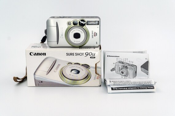 Canon Sure Shot 90u 35mm Point-and-Shoot Camera with Canon 38-90mm Zoom Lens. New, in original box, with original manual