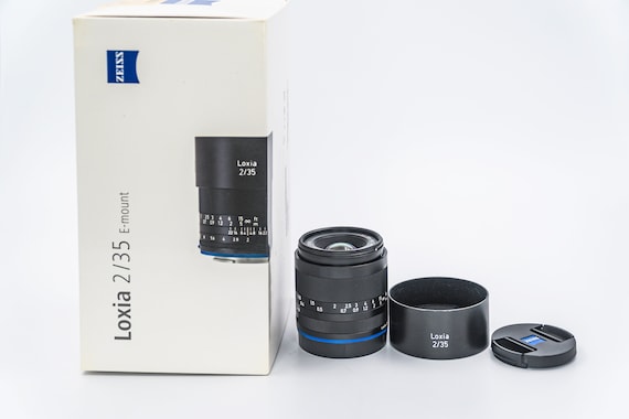 Zeiss Loxia 35mm f/2 Biogon T* Lens for Sony E Mount. Like New Condition, with original box and papers. Ideal for travel, weather sealed.