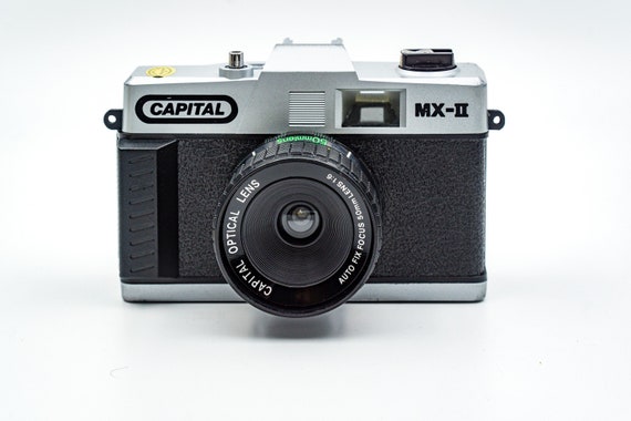 Capital MX-II 35mm camera. With Capital optical 50mm auto-fix focus lens. For Hipster Lomo style photography.  MINT!