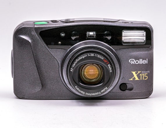 The Rollei X115 Zoom with Rolleigon 38-115 Zoom/Macro Lens, a 35mm camera with full auto shutter. Excellent condition!