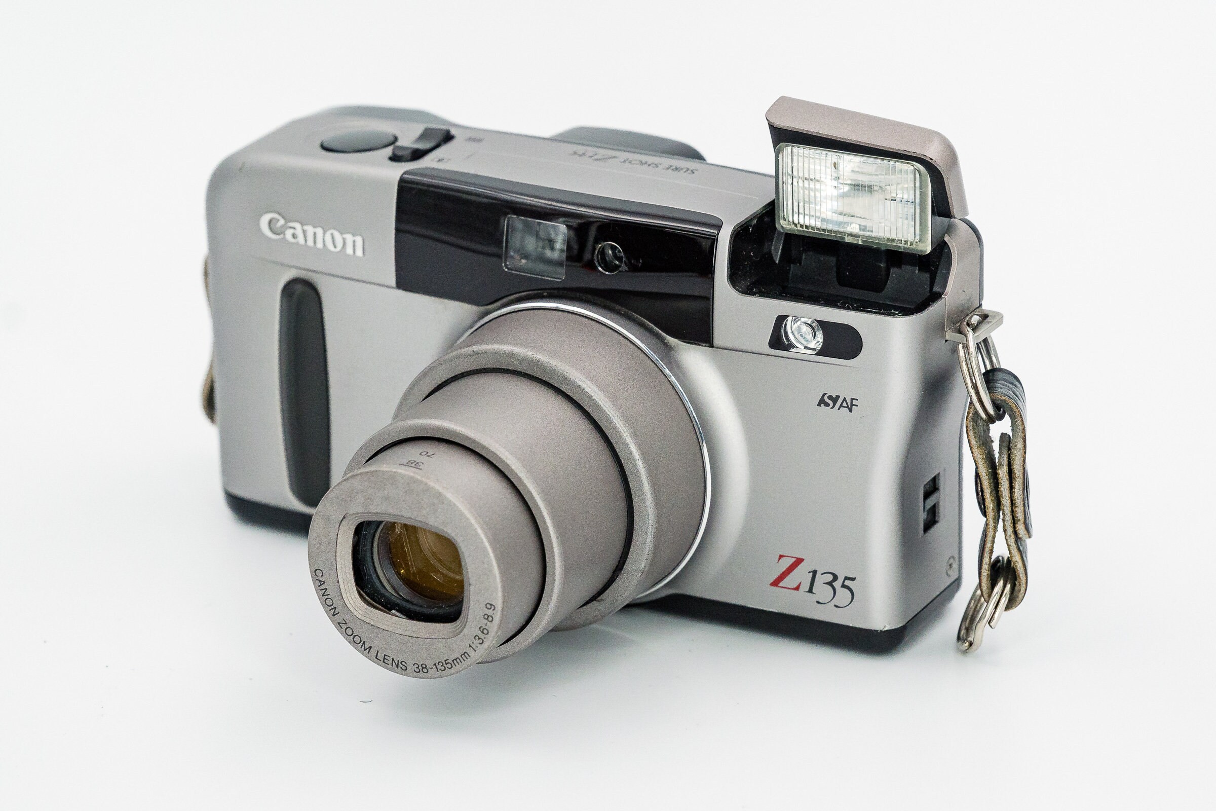 Canon Sure Shot Z135 Film Camera with 38135mm Canon lens.