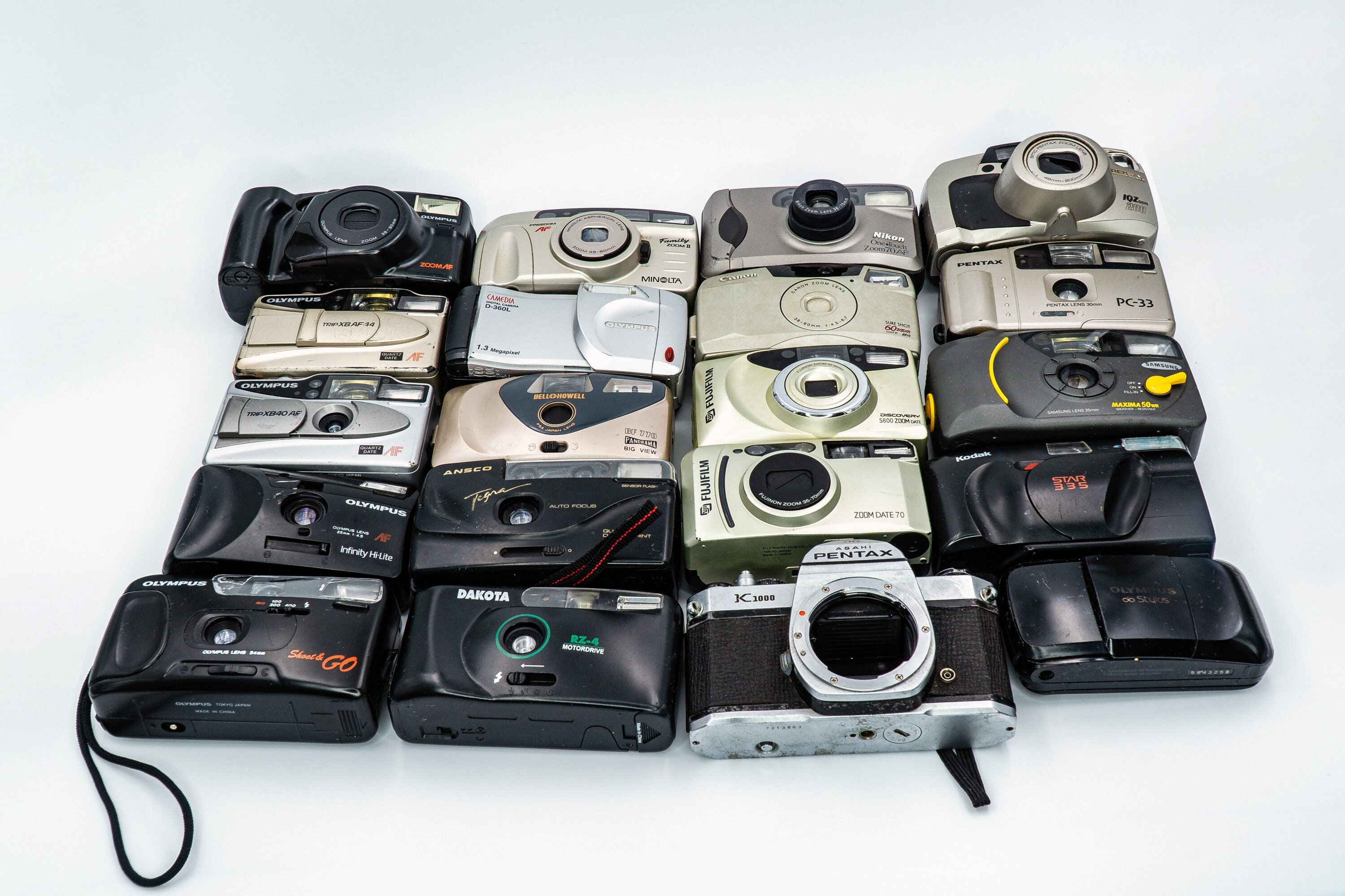 20 Various PointandShoot Vintage Cameras for Parts or Repair. No