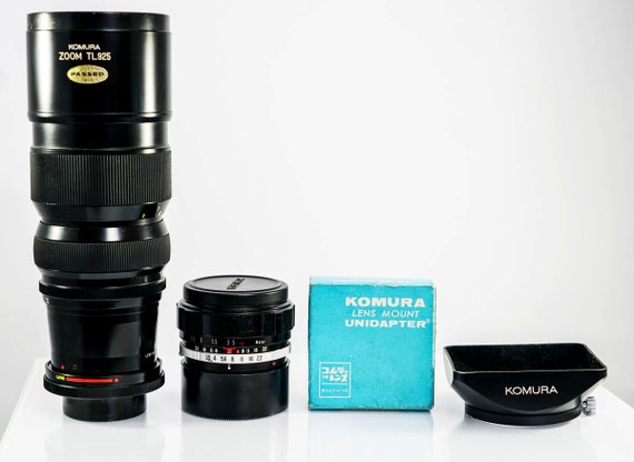 The W-Komura 28mm f/3.5 wide-angle prime lens + Komura 90-250 f4.5 Zoom lens bundled with Komura-to-42mm Unidapter