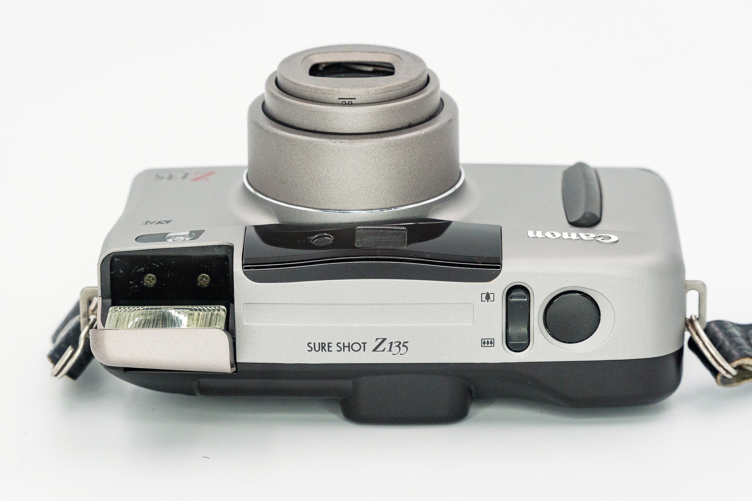 Canon Sure Shot Z135 Film Camera with 38135mm Canon lens.