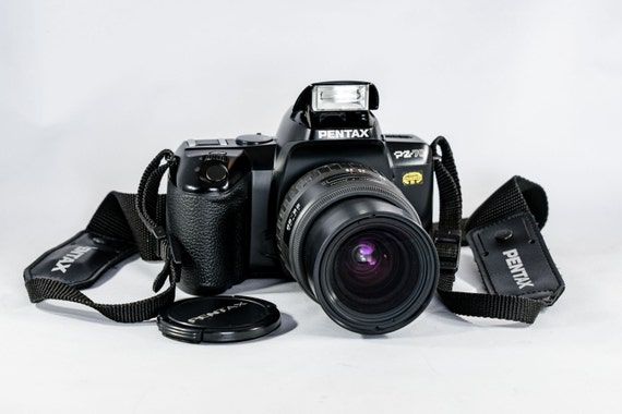 PENTAX PZ70 High End SLR Film Camera with TAKUMAR-F 28-80mm Zoom Lens and Back Data Module. Mint!