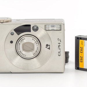 Canon ELPH 2 Ultra Compact Film Camera. Excellent camera in mint condition, with original leather case.