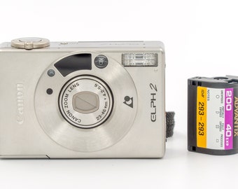 Canon ELPH 2 Ultra Compact Film Camera. Excellent camera in mint condition, with original leather case.