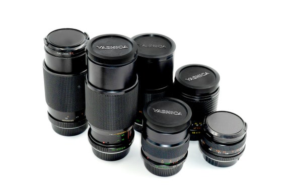 Collection of 7 Yashica Manual Lenses from private collection. C/Y mount, all in excellent condition, with both caps.