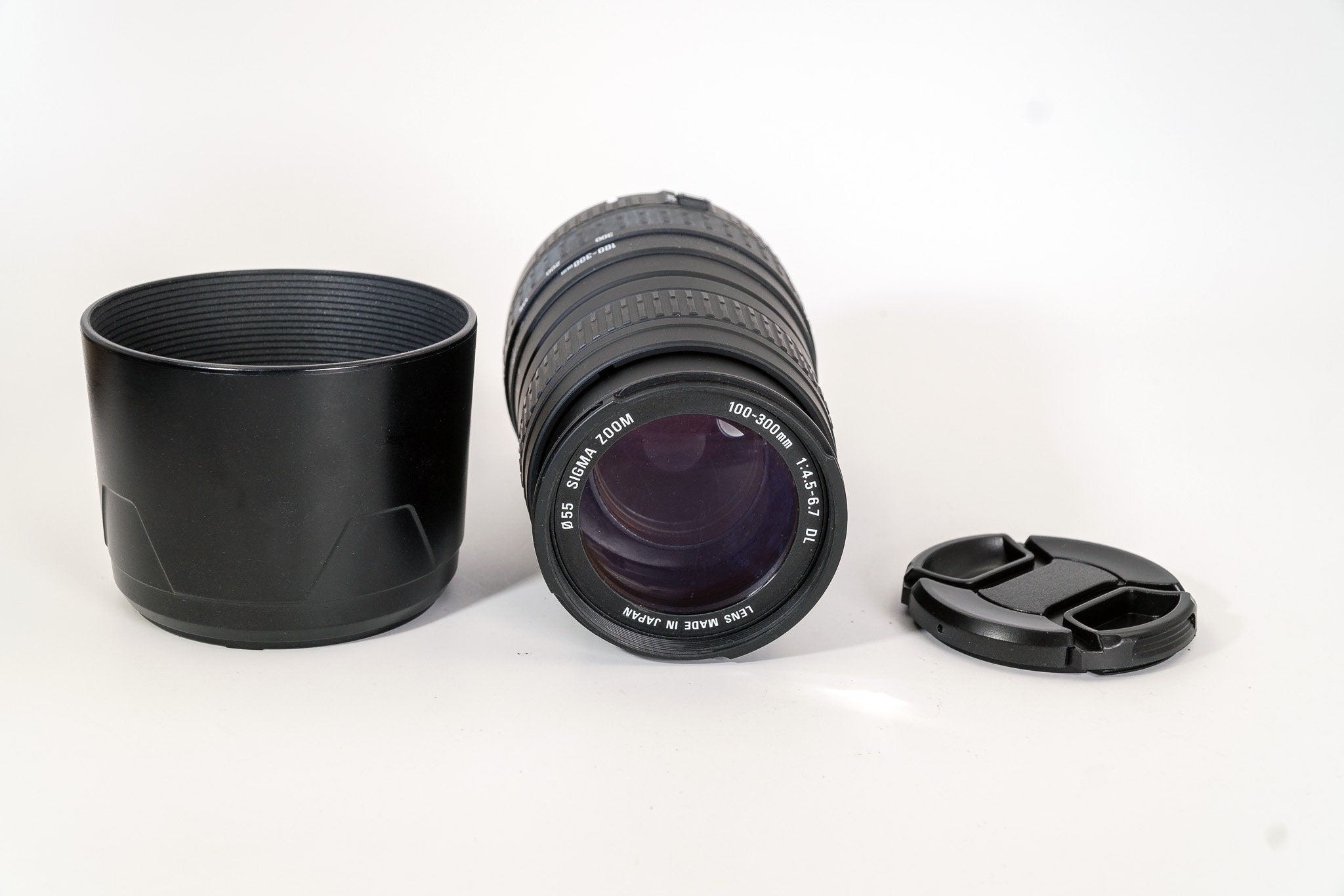 Sigma Autofocus 100300 mm f4.56.7 DL Lens. Canon mount. With both