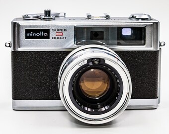 Minolta Hi-Matic 11 Rangefinder with Rokkor-PF 45mm f1.7 fast lens. In very good working condition!