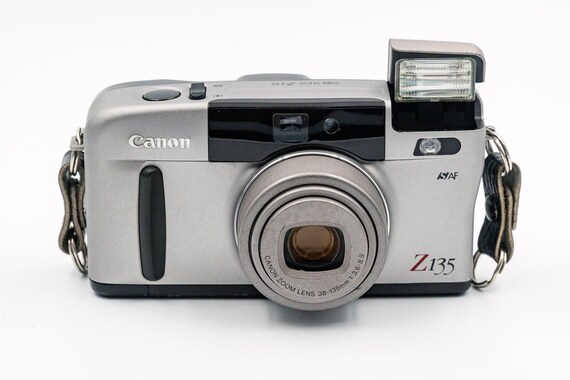 Canon Sure Shot Z135 Film Camera with 38–135mm Canon lens.