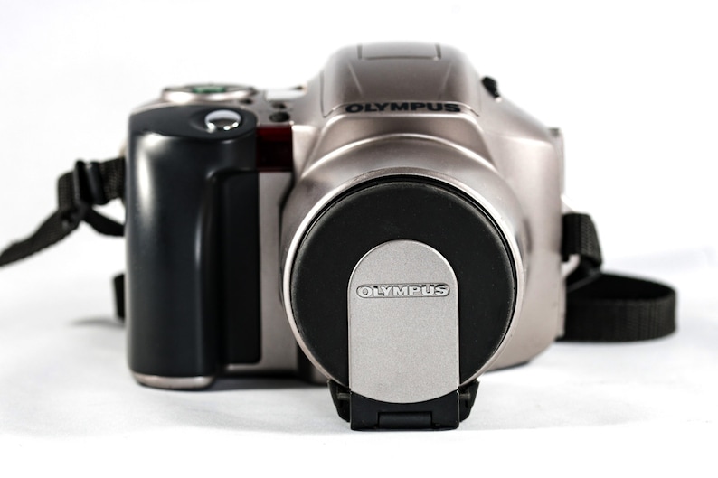 OLYMPUS IS-20200 QuartzDate All-in-One Camera with 28mm 110mm Aspherical Lens.