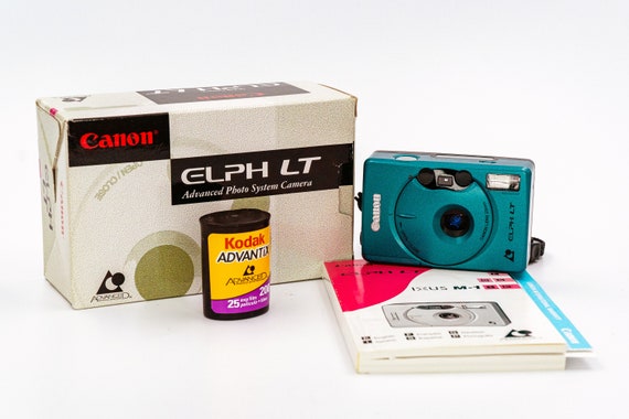 Canon ELPH LT IXUS M1 Ultra Compact Film Camera. Excellent camera in like new condition, with original box and manual