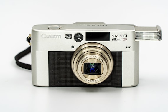 Canon SureShot Prima Classic Super 120 - Date Camera with 38-120mm Canon Lens.